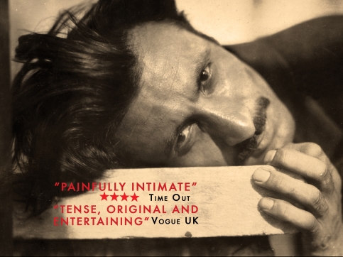 Poster advertising a movie with red text atop a detail of a sepia photograph of a man's head resting horizontally on a table