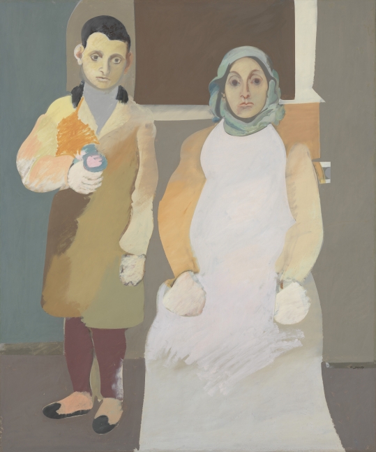 Front-facing portrait of a boy in a yellow, brown, and orange suit holding flowers standing next to a seated woman with large eyes wearing a shawl and a white dress in front of a gray architectural background with a brown window